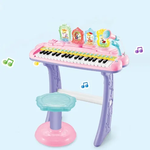 Детский музыкальный инструмент Синтезатор с микрофоном и стульчиком звуковые и световые эффекты DJ 207 розовый
